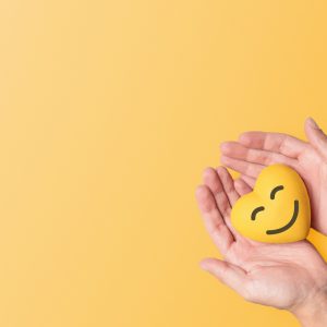 Smiling Heart in Hand