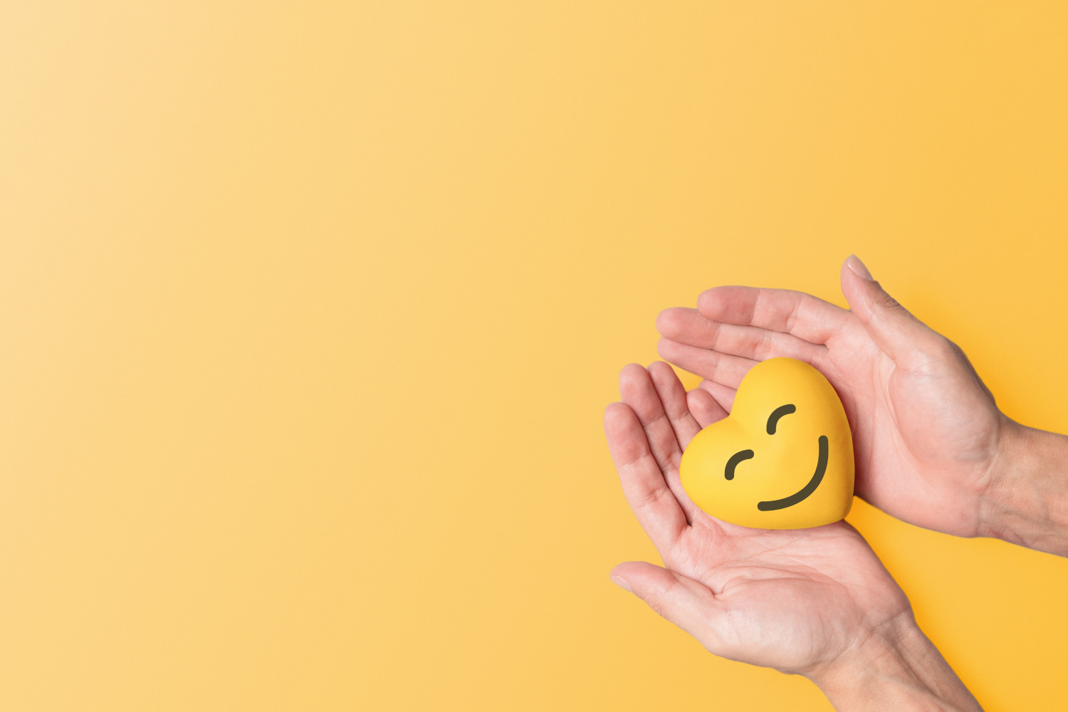 Smiling Heart in Hand