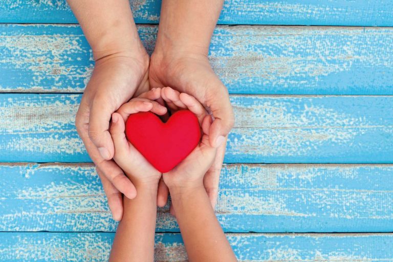 Hands holding a heart